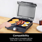 Ninja Sizzle GR100 Smokeless Indoor Grill, 500°F High Heat Kitchen Grill with Nonstick 14-Inch Plate, Low-Smoke Technology, Edge-to-Edge Heating, Family-Sized Capacity, Countertop Cooking Tool