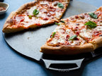 Lodge Seasoned Cast Iron Pizza Pan - Pre-Seasoned, Round Pizza Pan with Dual Assist Handles - Even Heat Distribution- PFAS-Free, Non-Toxic Cookware - Oven Safe - 15 Inch