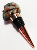 Mazeology’s Handcarved Gemstone Quality Bloodstone Carved SKULL Shaped Wine Bottle Stopper with Six Silicon Food Grade Rings and Rust-proof Aluminum to keep wine fresh.