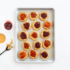 Nordic Ware Brilliant™ Colorful Bakeware 18 x 13 Half Sheet Pan, Nonstick made without PFAS or PTFE for safe cooking; Reinforced steel rim prevents warping