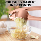 Zulay Kitchen Large Premium Garlic Press Set - Bigger Bowl for Bigger Garlic - Rust Proof Garlic Mincer Tool - Easy-Squeeze, Easy-Clean Silicone Garlic Peeler & Brush (Rose Gold)