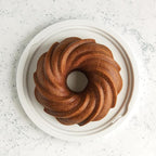 Nordic Ware Formed Swirl Bundt with Keeper, 10 Cup, Twilight Blue
