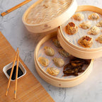 KITCHENCRUST Bamboo Steamer Basket for Chinese Asian Cuisine - 2 Tier 10-Inch Steaming Basket Bun Vegetable Bao Buns, Sauce Dish, Chopsticks, Reusable Liners